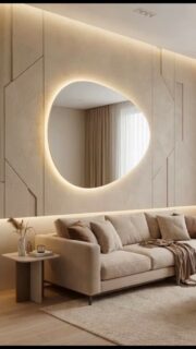 Espejo asimétrico con diseño moderno y luz cálida